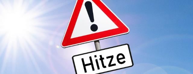 Warnschild mit Schriftzug "Hitze"